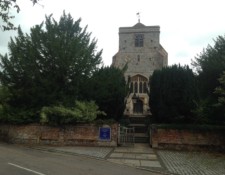 You'll pass by St John the Baptist Church when you leave that Huxley village Puttenham behind...